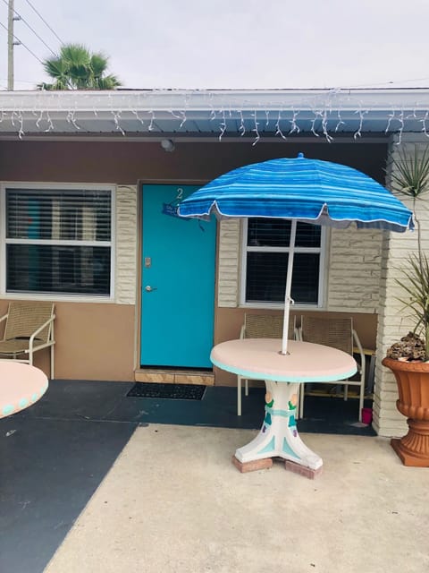 PRIVATE PATIO UMBRELLA TABLE UNDER THE PORCH for morning coffee & paper. 