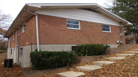 Gently sloping steps lead to your LL apartment entrance. Solar lights for safety