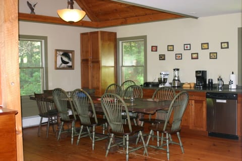 The kitchen table is a  comfortable place for everyone to commune. 