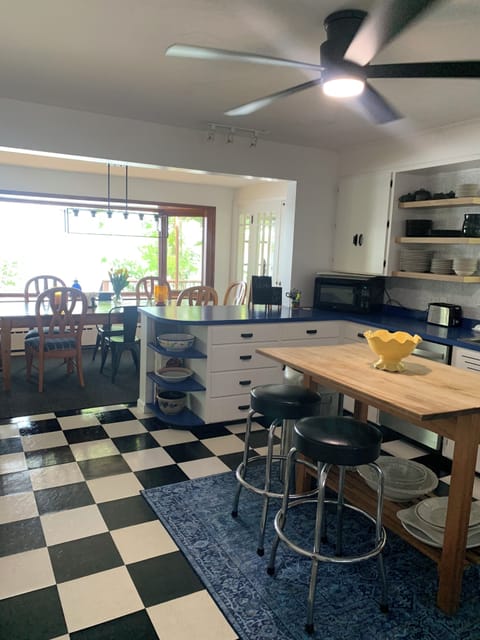 Kitchen with island over looking dining room