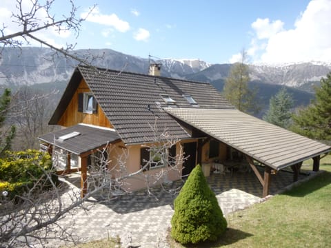 La Pommière in early spring with the vestiges of snow on the mountain tops