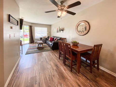 Dining and living area with natural light, perfect for meals and relaxation together
