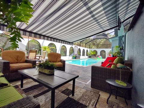 1,200 sq ft of screened-in, bug-free outdoor living on your Naples FL vacation
