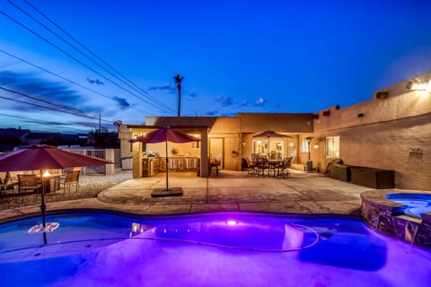 Breathtaking backyard oasis w/relaxing lighted pool/spa, outdoor kitchen,firepit