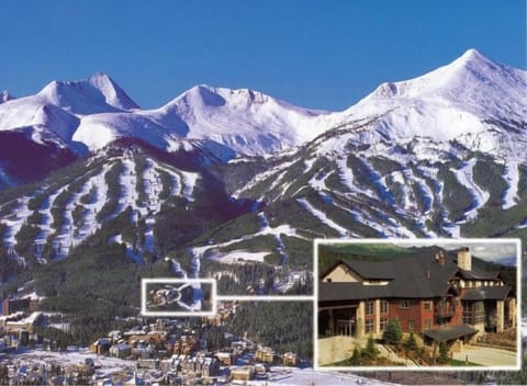 Photo of Lodge at the base of trail adjacent to two lifts.