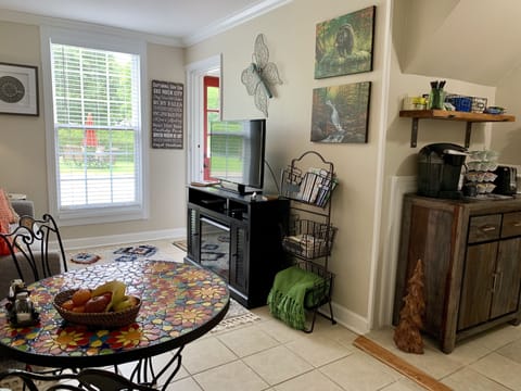 Living room includes Smart HDTV w/Netflix and Amazon Prime, electric fireplace.