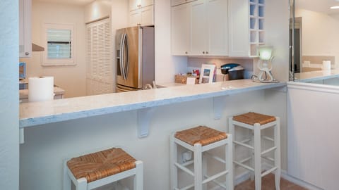 Bar area looking into kitchen.