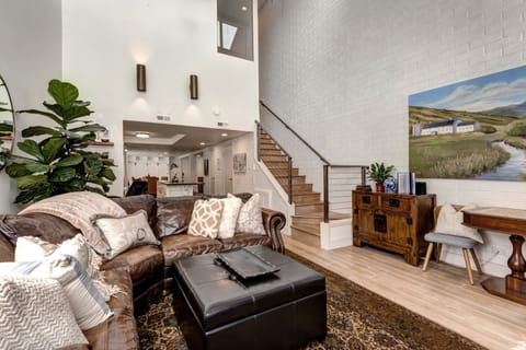 Great room w/ 20 foot ceilings and views to enjoy of the Nordic Skiing and golf.