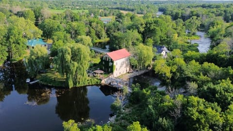 Showing the mill located on an island in the Salmon River.