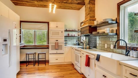 Kitchen- Newly renovated with new appliances, double ovens, and now an open flow to living area. Included is coffee/tea bar, insta-pot, crock pot, gridle, blender, and just about anything you might need for your group. Just ask, we probably have it!