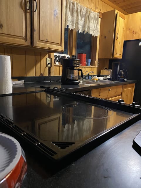 Kitchen with pots and pans, plates, silverware, cups, etc 