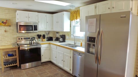 Newly remodeled kitchen with top of the line appliances for your convenience.