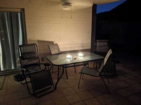 Backyard- Covered patio seating. Additional seating also