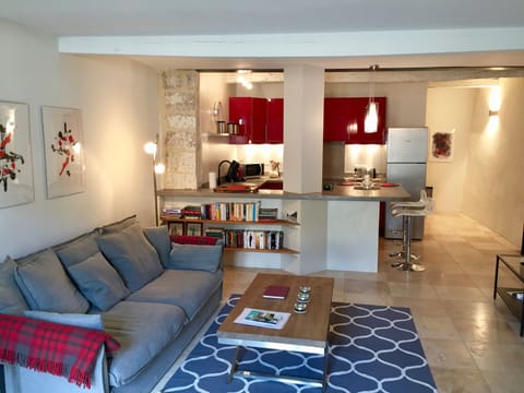 Living room with open plan kitchen/dining area