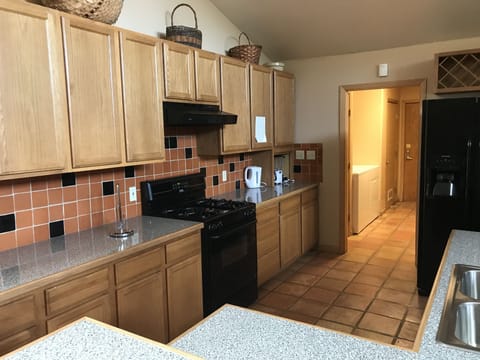 Clean, stocked kitchen area