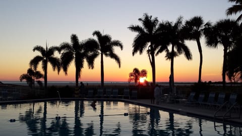 Delight in the Massive Heated Pool on the Beach & Stunning Sunsets