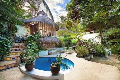 Entrance-showing pool and small private palapa