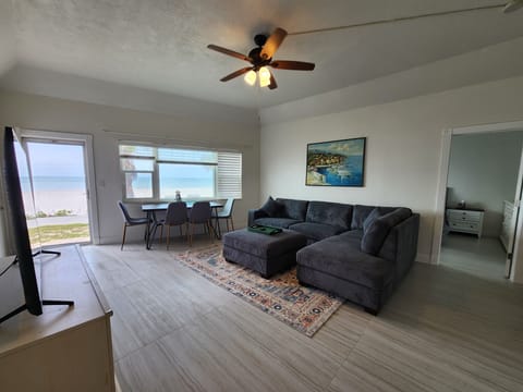 Gorgeous views from the living/dining area with a door to direct beach access.