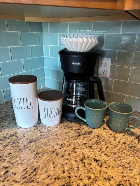 Coffee, sugar and creamer provided for guests