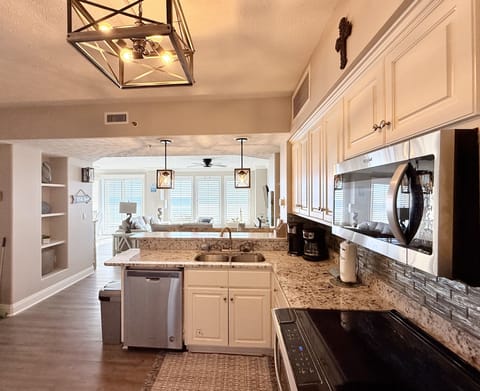 Immaculate Kitchen well-appointed with all you need. New lighting fixtures.