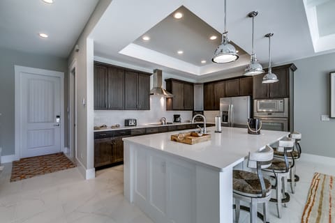 Kitchen accommodates several cooks at once :) 