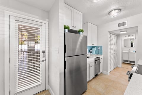 Fully equipped kitchen with a Nespresso, Keurig, drawer microwave, & dishwasher