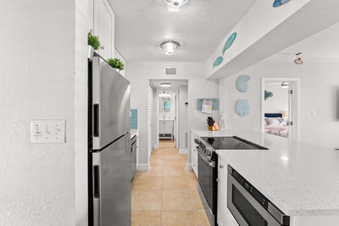 Fully equipped kitchen with a Nespresso, Keurig, drawer microwave, & dishwasher