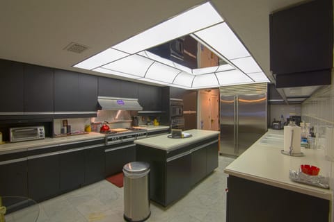 Commercial gas range in kitchen