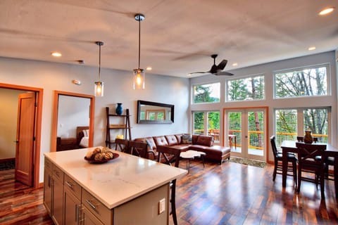 Large island in kitchen with matching quartz countertops 