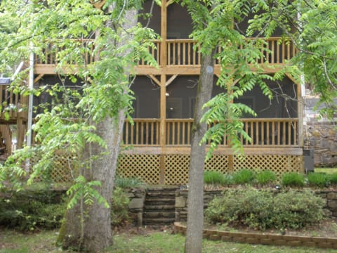 Back of the house from the lawn.  Just a short walk to the river.