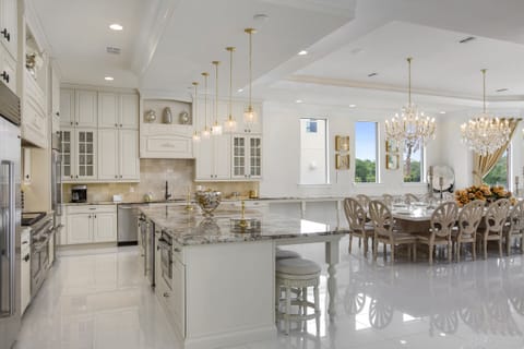 The kitchen has custom cabinentry and top of the line appliances