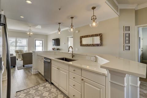 Beautifully updated kitchen with pendant lights and all new appliances
