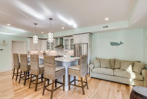 Look At All that seating! Another sofa is by kitchen so that the cooks can enjoy