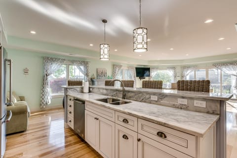 The second floor is a great space to relax, cook, watch TV, or play games!