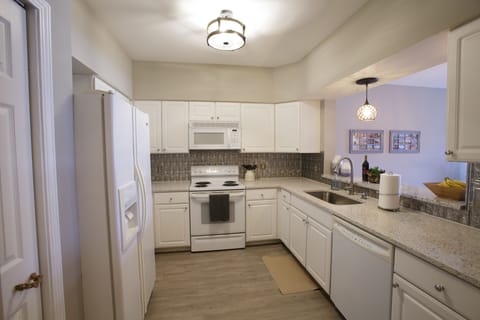 Full sized kitchen stocked supplied with all your cooking needs.