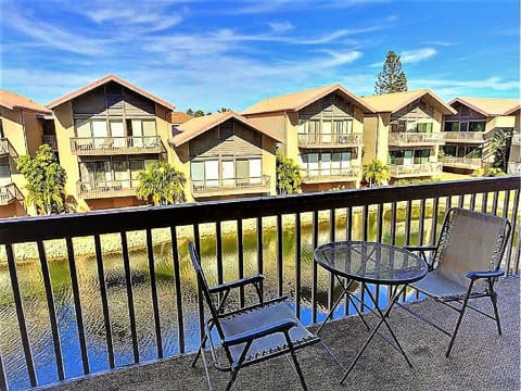 Balcony overlooking the  serene emerald green lake with local turtle