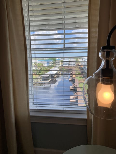 Enjoy the water view from your king sized bed!