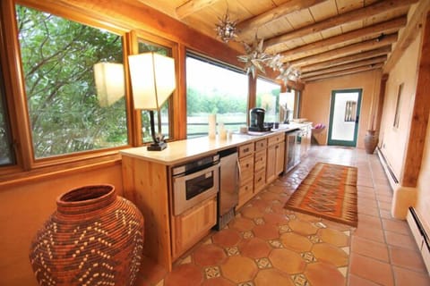 Hospitality room with under counter microwave, icemaker, wine cooler, beverage cooler