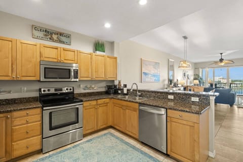 Fully Equipped Kitchen with Stainless Steel Appliances and Granite Countertops