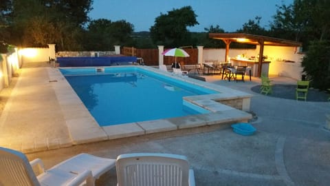 As the sun goes down carry on enjoying the pool area