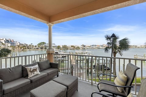 Sit Back, Relax, and Enjoy Harbor Views from the Private, Covered Balcony