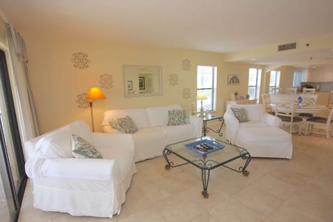 Put your feet up and relax and enjoy the Flat Screen TV after a day of shopping or at The Beach in this lovely spacious living room