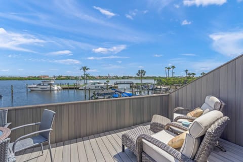 Sit down with your morning cup of coffee and watch the boats sail by!