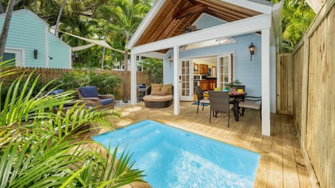 SWEPT AWAY is a meticulously renovated two bedroom home with a mix of classic Key West and a new coastal style...