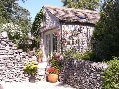 Detached stone barn in a Peak District conservation village. 