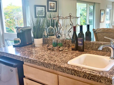 Mini-fridge, sink and Keurig coffee maker