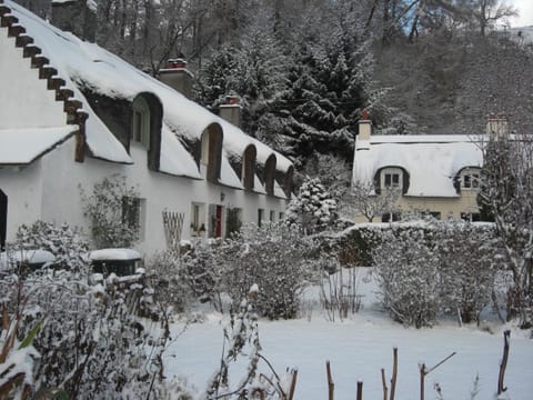 Thatched cottages in winter