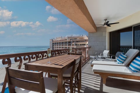 On the patio, the awesome views are easy to enjoy with four chaise lounges, and two raised cafe tables!