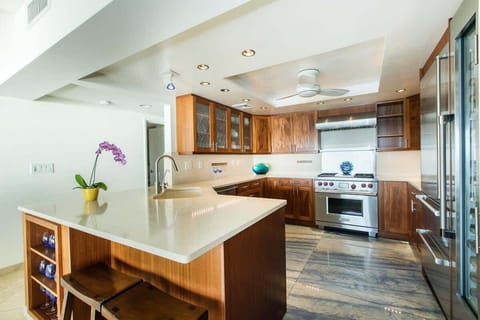 Spacious kitchen with bar seating