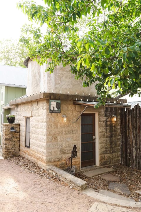 The Pumphouse exterior – historic limestone structure with unique charm.